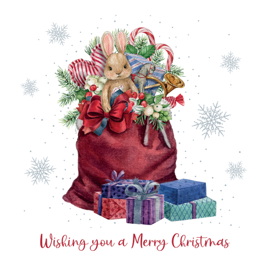 A Christmas card with a burgundy Christmas sack with a bunny and toys popping out the top