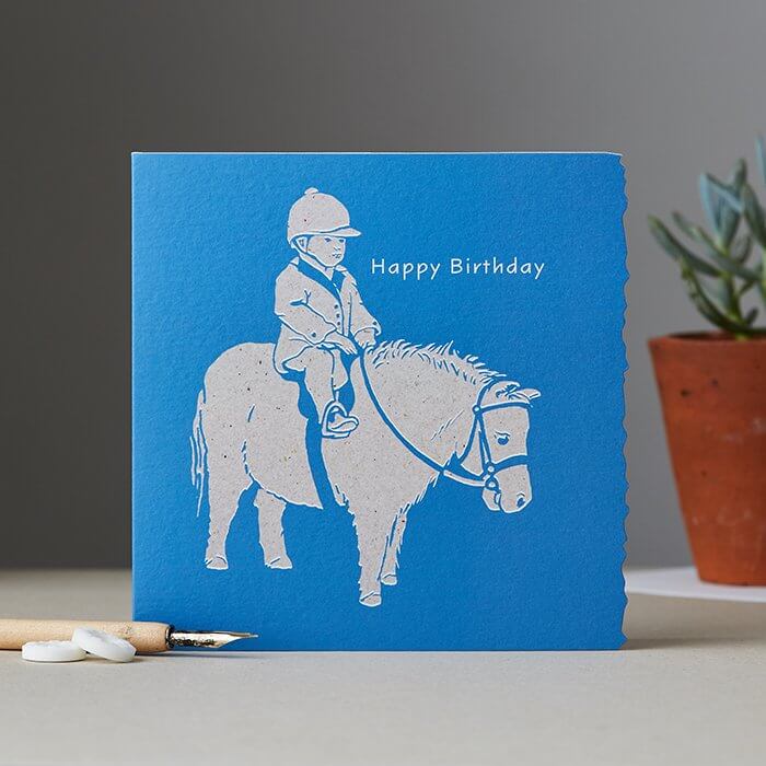 Tarjeta de felicitación Pony con bloques de color y borde adornado