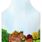 Image shows a cotton apron with a beautifully drawn image of our brown mule muffin standing in a grassy field with a line of autumnal colour trees