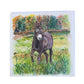 Image shows a beautiful illustration of our brown donkey called Denver standing in a field with a mixture of shades of green trees in the background