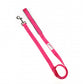Image shows a birght pink dog lead with a silver hardwear clip and the white Doodlebone logo badge