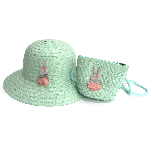 image shows a aqua blue childrens panama hat with a small grey rabbit in the centre wearing a pink tutu with pink glittery crown. A small cross body matching bag is also incldued