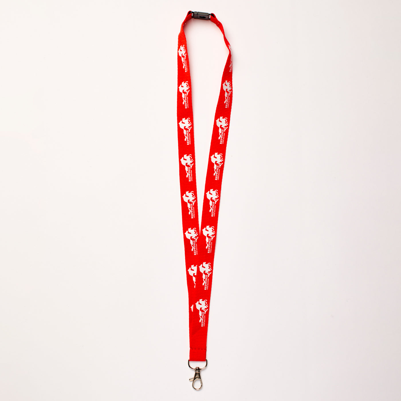 Image shows a red lanyard with our white Redwings logo printed continuiously all the way round