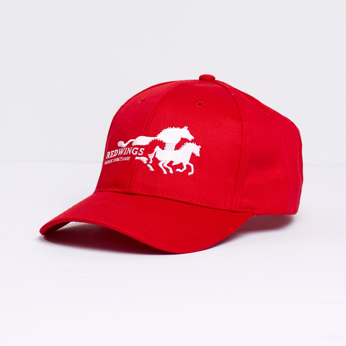 image shows a red baseball cap with our Redwings white logo embroidered in the centre