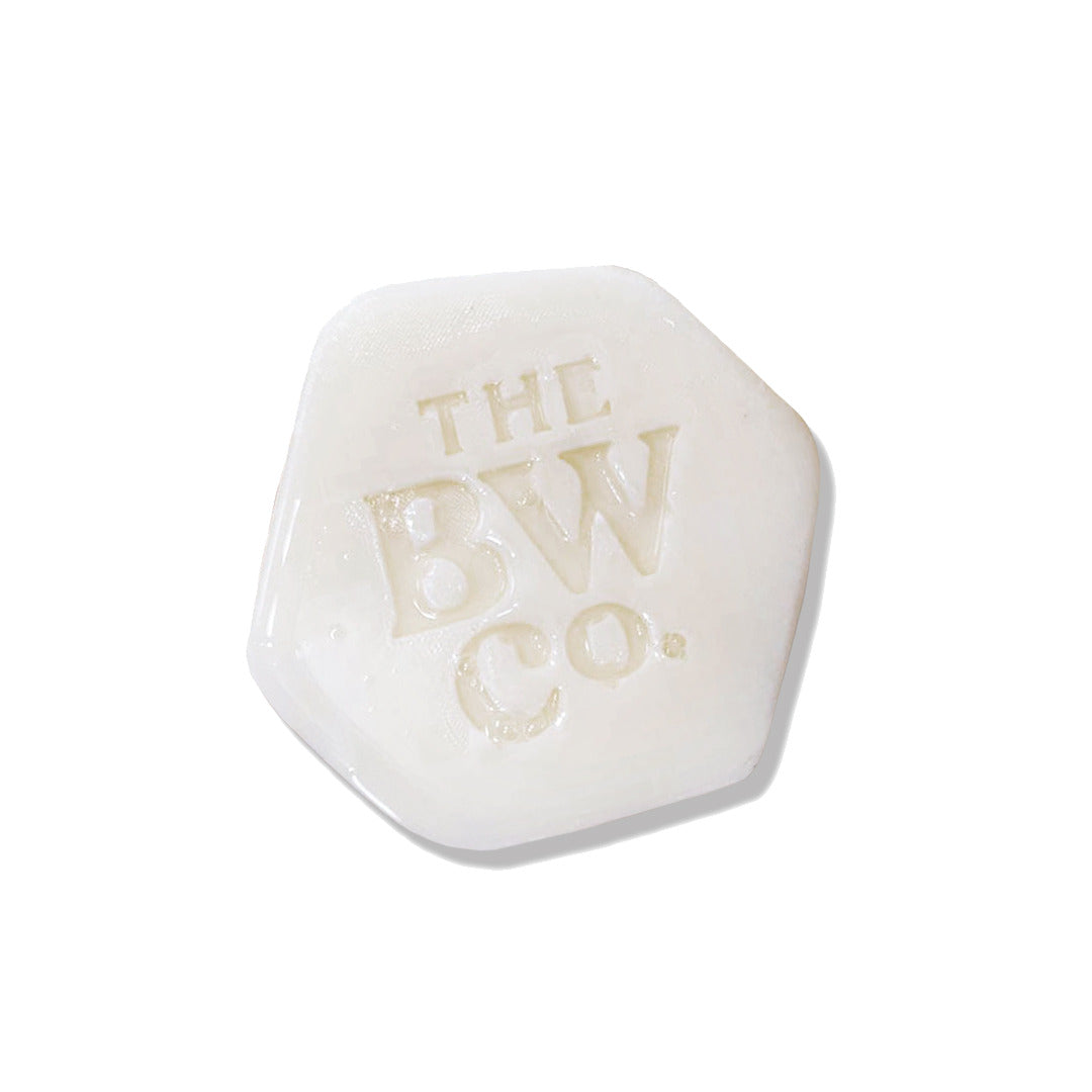 image shows a white hexagonal bar of soap with the words The BW Co stamped into the middle